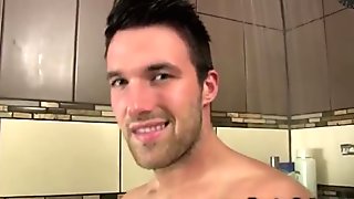 Gay jock has a hard feeling in the shower with a dick in his hands