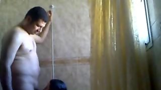 Arab couple play in the shower
