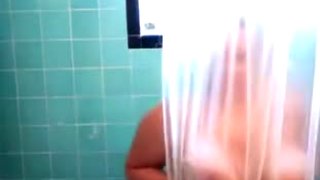 Voyeur vid of BBW in the shower
